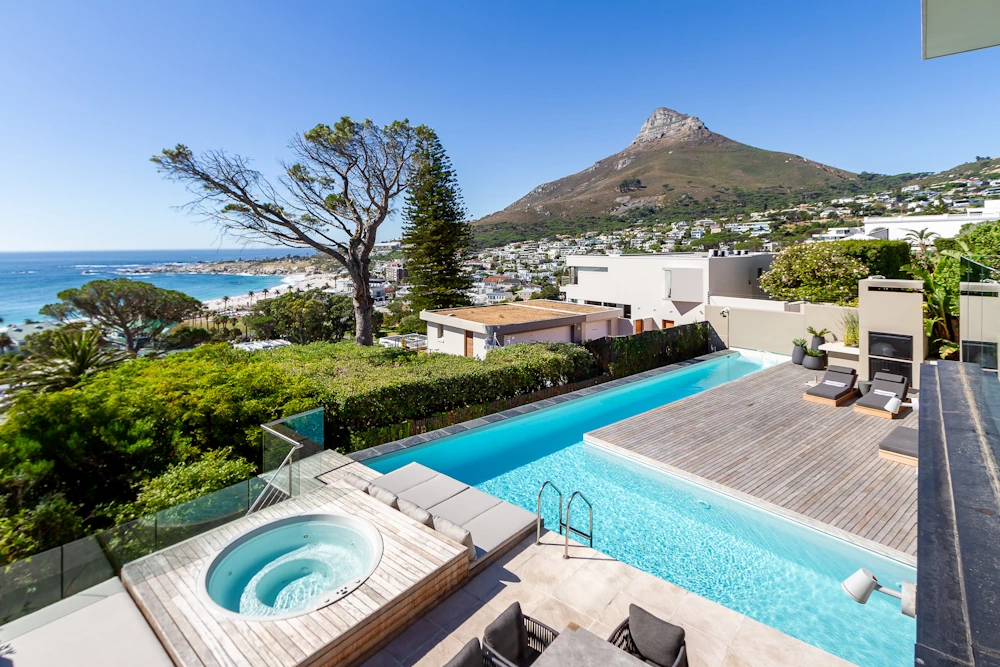 Private jacuzzi and pool deck at Serenity Villa luxury villa Camps Bay